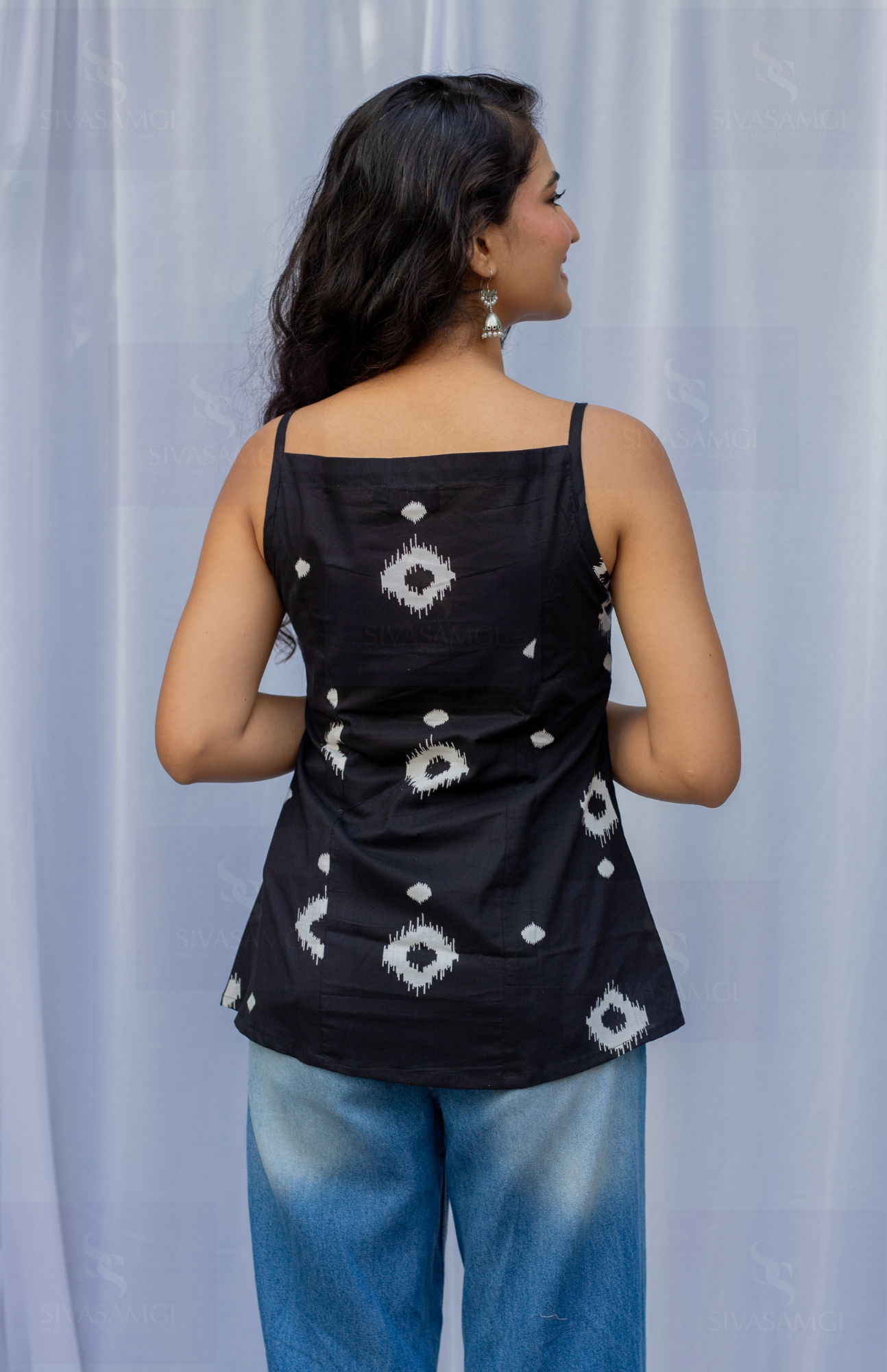 Back view of black cotton cambric strap top for women