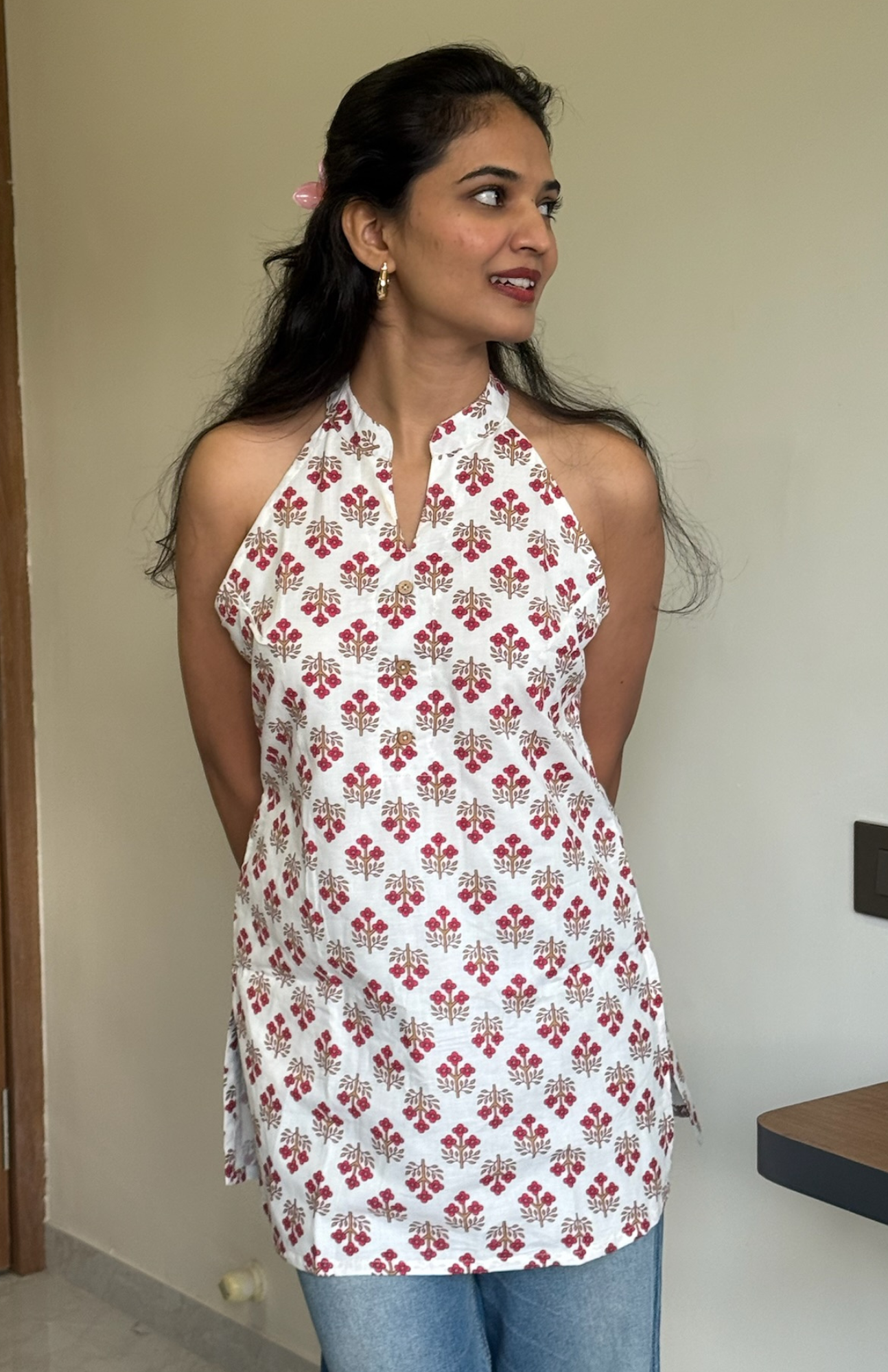 White floral cotton halter neck short kurti for women with pocket paired with jeans