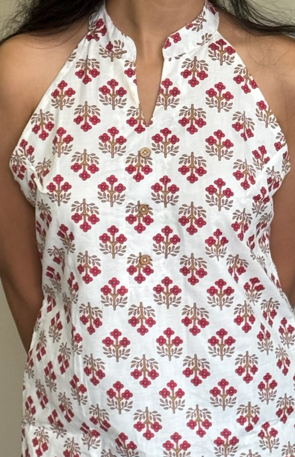 White floral printed cotton halter neck short kurti fabric closeup
