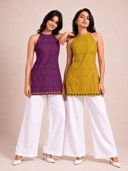 Purple side of reversible halter neck short kurti with mustard motifs