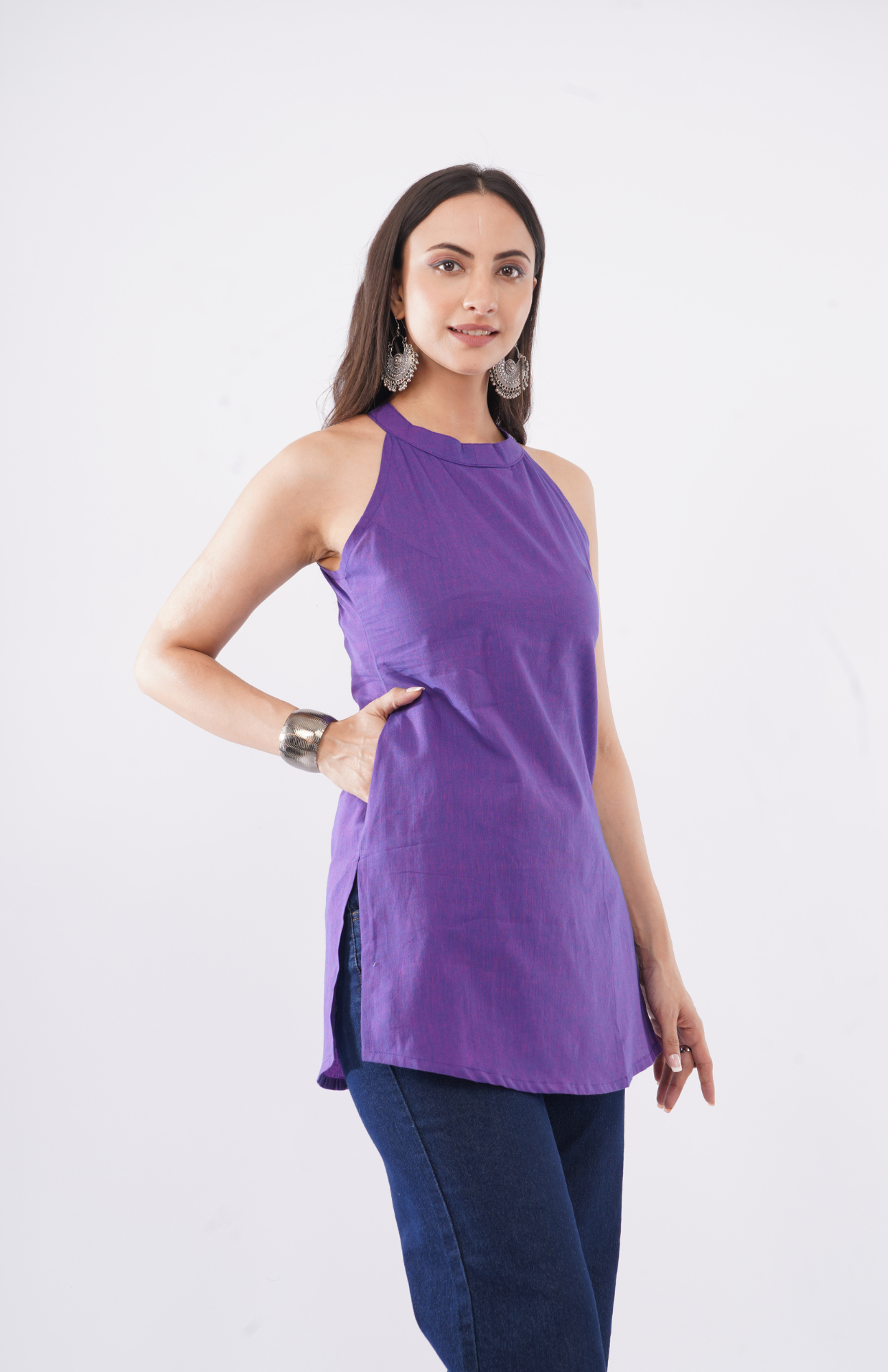 purple short kurti styled with jeans