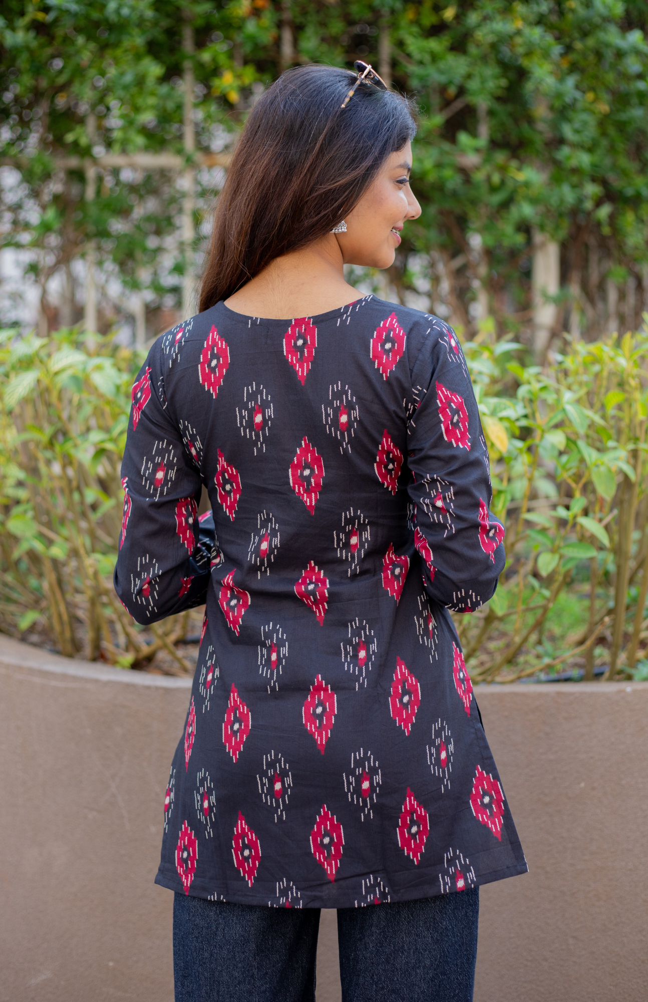 Black Ikkat Print V Neck Full Sleeves Short Kurti with Pocket