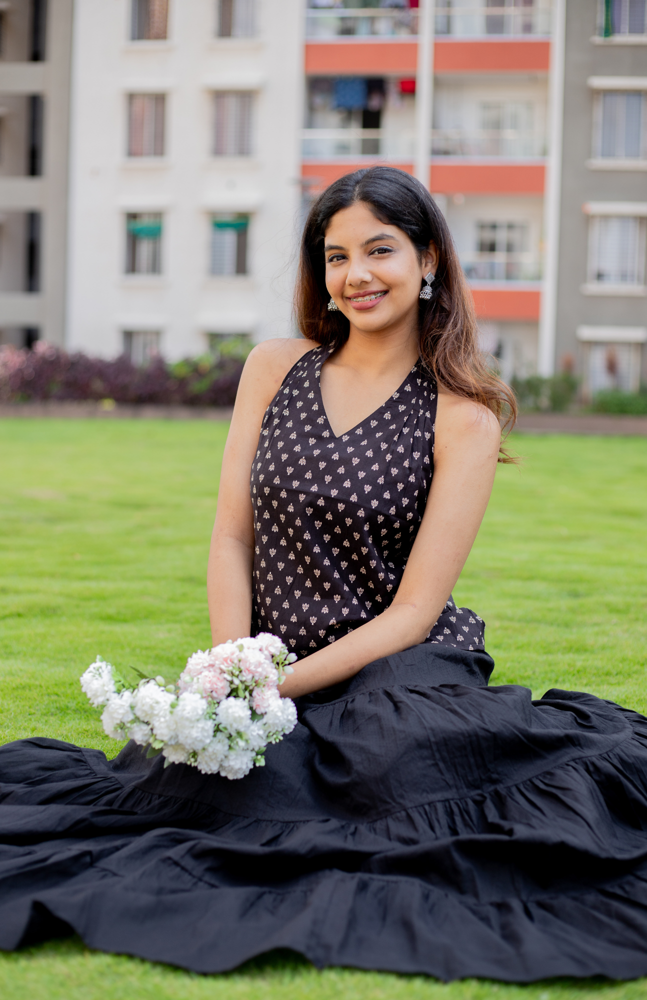 Black Butti Print V Neck Halter Neck Cotton Top paired with black skirt